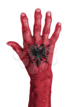 Hand of an old woman with arthritis, isolated on white, Albania