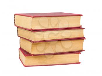 Stack of old books with red covers, isolated