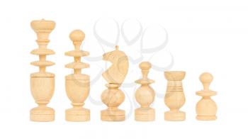 Set of old handcarved chess pieces isolated on a white background