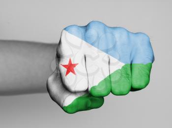 Fist of a man punching, flag of Djibouti