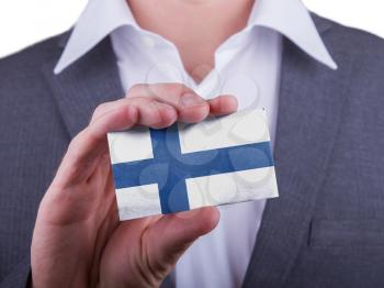 Businessman showing card, matte paper effect, Finland