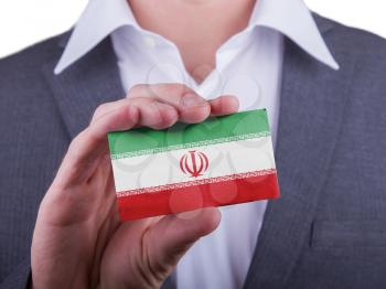 Businessman showing card, matte paper effect, Iran