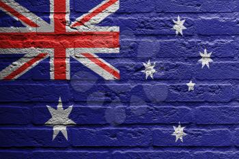 Brick wall with a painting of a flag isolated, Australia