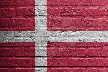 Brick wall with a painting of a flag isolated, Denmark