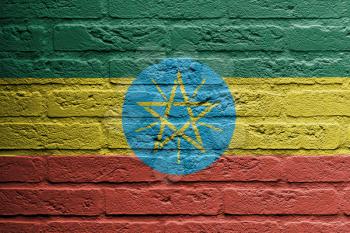 Brick wall with a painting of a flag isolated, Ethiopia