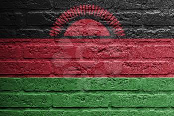 Brick wall with a painting of a flag isolated, Malawi
