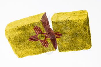 Rough broken brick, isolated on white background, flag of New Mexico