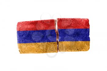 Rough broken brick, isolated on white background, flag of Armenia
