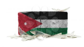 Brick with broken glass, violence concept, flag of Jordan