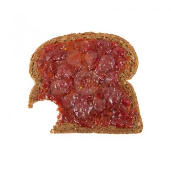 Slice of brown bread with jam isolated on white