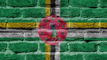 Very old brick wall texture, flag of Dominica