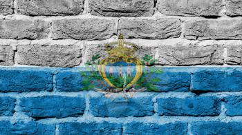 Very old brick wall texture, flag of San Marino