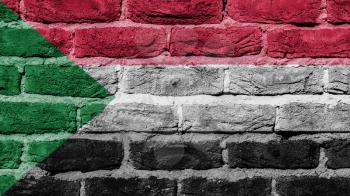 Very old brick wall texture, flag of Sudan