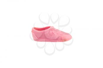Pink toy shoe isolated on a white background