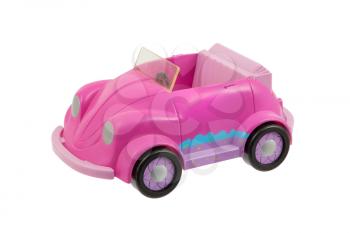 Old pink plastic toy car isolated on white