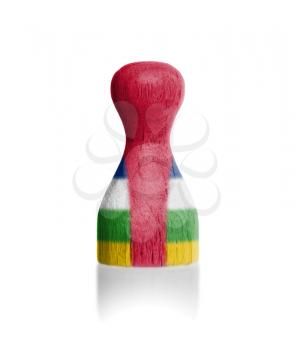 Wooden pawn with a painting of a flag, Central African Republic