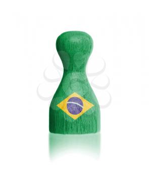 Wooden pawn with a painting of a flag, Brazil
