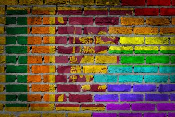 Dark brick wall texture - coutry flag and rainbow flag painted on wall - Sri Lanka