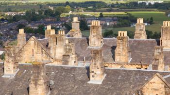 Roof of an old Scottish building, many chimneys