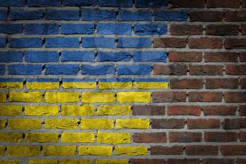 Dark brick wall texture - flag painted on wall - Ukraine