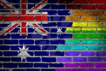 Dark brick wall texture - coutry flag and rainbow flag painted on wall - Australia
