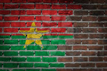 Dark brick wall texture - flag painted on wall - Burkina Faso