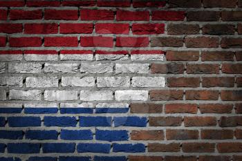 Dark brick wall texture - flag painted on wall - Netherlands