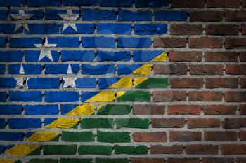 Very old dark red brick wall texture with flag - Solomon Islands