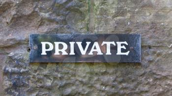 Private sign on a stone wall, Edinburgh - Scotland