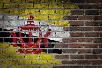 Dark brick wall texture - flag painted on wall - Brunei