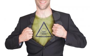 Businessman opening suit to reveal shirt with sign, poisonous