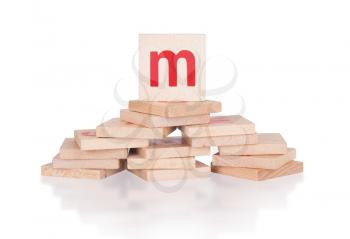 Alphabet - abstract of vintage wooden blocks - letter M