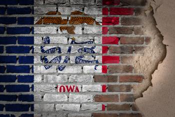 Dark brick wall texture with plaster - flag painted on wall - Iowa