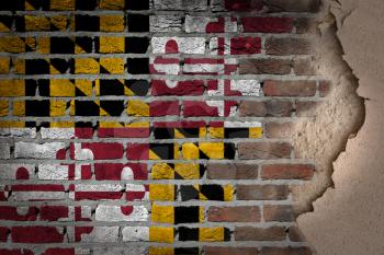 Dark brick wall texture with plaster - flag painted on wall - Maryland