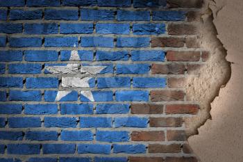 Dark brick wall texture with plaster - flag painted on wall - Somalia