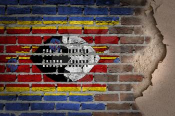 Dark brick wall texture with plaster - flag painted on wall - Swaziland