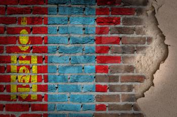 Dark brick wall texture with plaster - flag painted on wall - Mongolia
