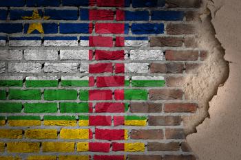 Dark brick wall texture with plaster - flag painted on wall - Central African Republic