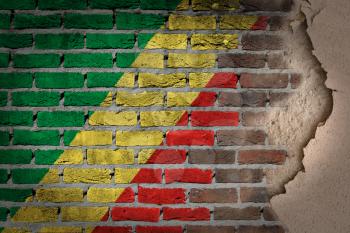 Dark brick wall texture with plaster - flag painted on wall - Congo