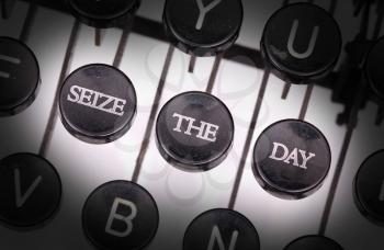 Typewriter with special buttons, seize the day