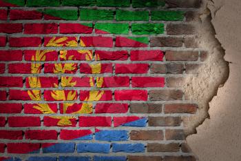 Dark brick wall texture with plaster - flag painted on wall - Eritrea