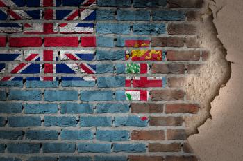 Dark brick wall texture with plaster - flag painted on wall - Fiji