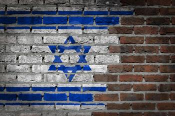Very old dark red brick wall texture with flag - Israel