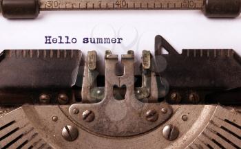 Vintage inscription made by old typewriter, hallo summer