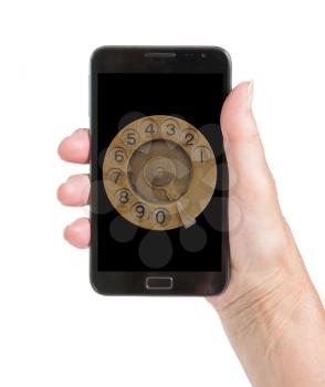 Senior woman hand with smart phone isolated, old fashion dial, isolated