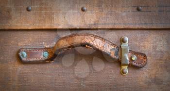 Old canvas trunk handle close up, vintage