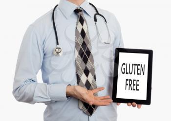 Doctor, isolated on white backgroun,  holding digital tablet - Gluten free