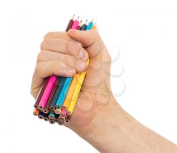 Used pencils in hand isolated on white background