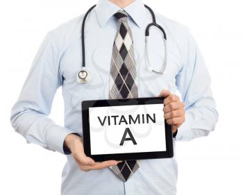 Doctor, isolated on white backgroun,  holding digital tablet - Vitamin A