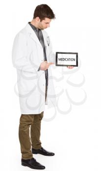 Doctor holding tablet, isolated on white - Medication